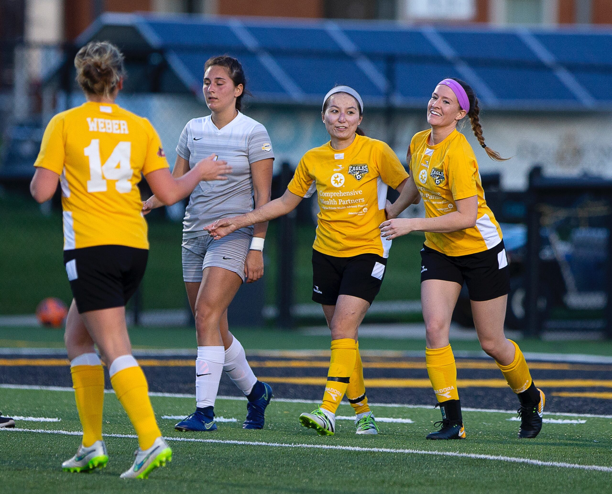 Rachel MacLeod (right) and Lisa Nouanesengsy celebrate MacLeod's goal against Ohio Dominican University | Daniel Herlensky