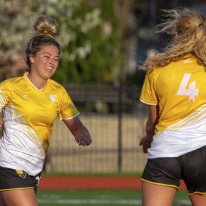 Brooklyn Pritt (left) celebrates her first goal against Otterbein University on April 14, 2019. The Eagles won 5-0. | Daniel Herlensky