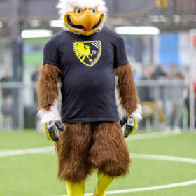 Columbus Eagles mascot walking across field
